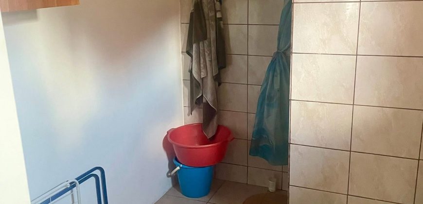 Casa parter,centru -Margineni,teren 1366 mp